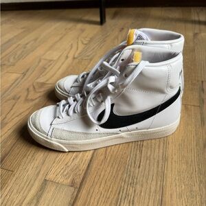 Nike Women's High-Top Sneakers in White and Black with Yellow Tongue Tab